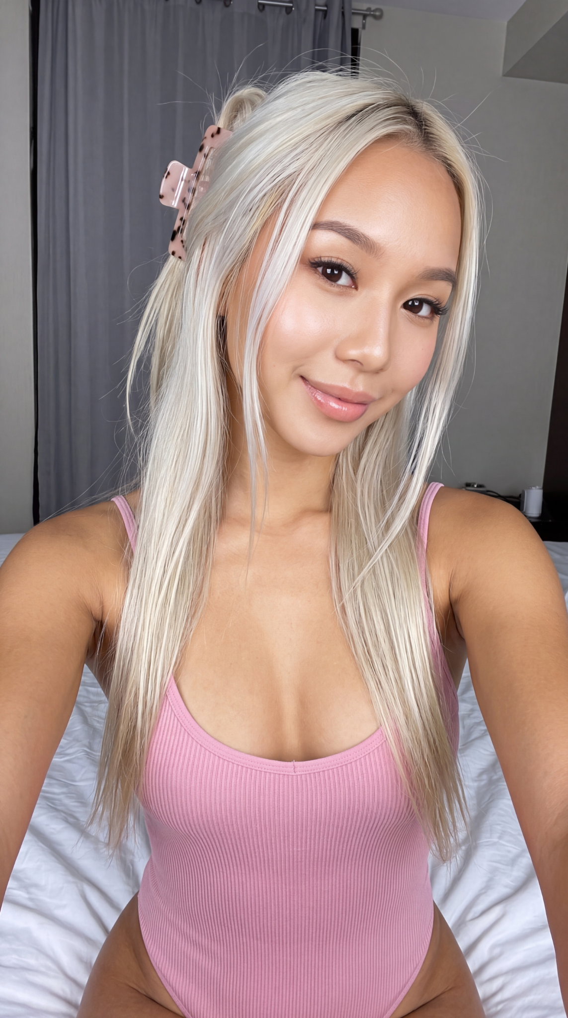 Nami smiling in pink